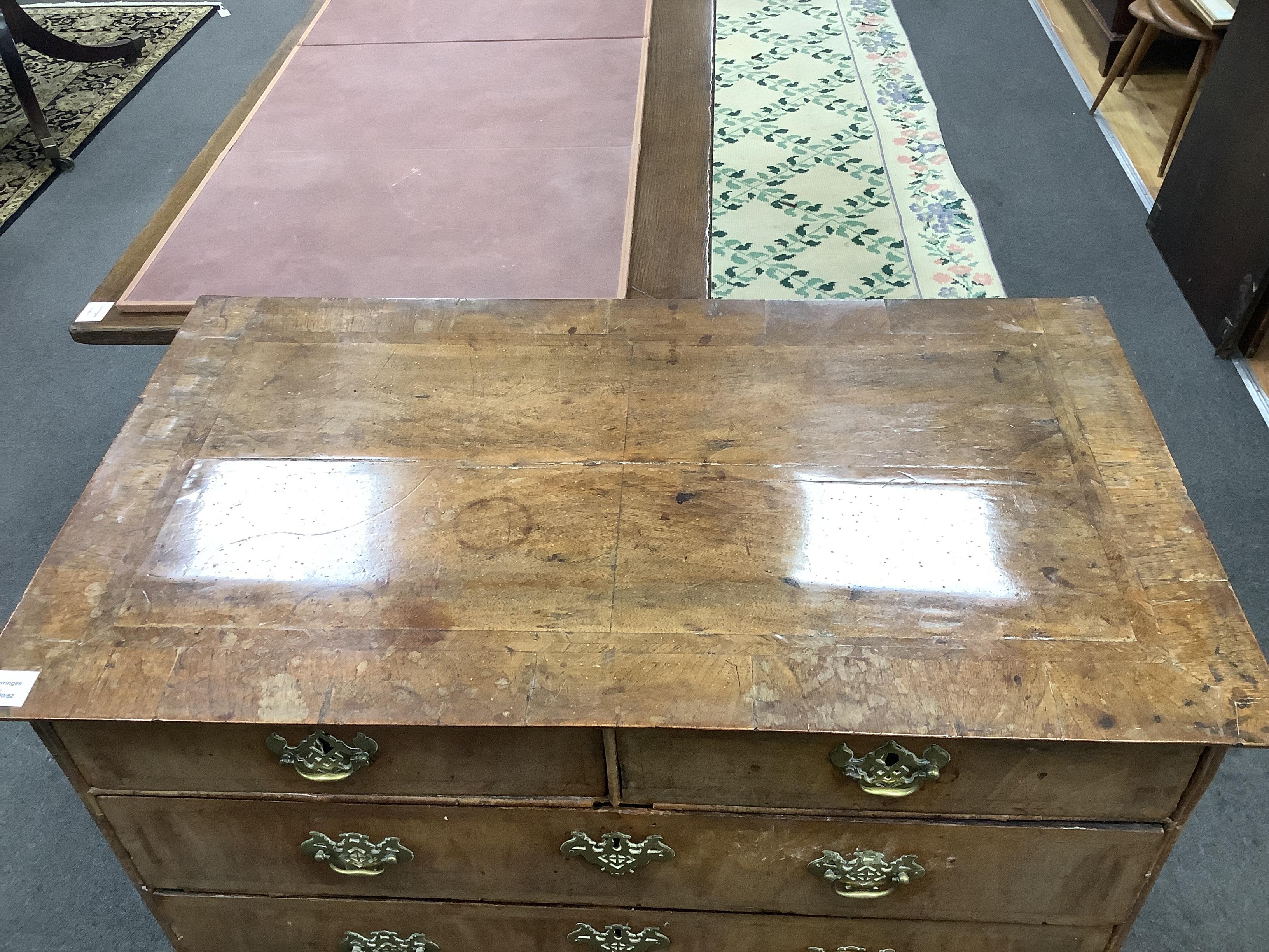An 18th century feather banded walnut chest of two short and three long drawers, width 96cm, depth 55cm, height 82cm